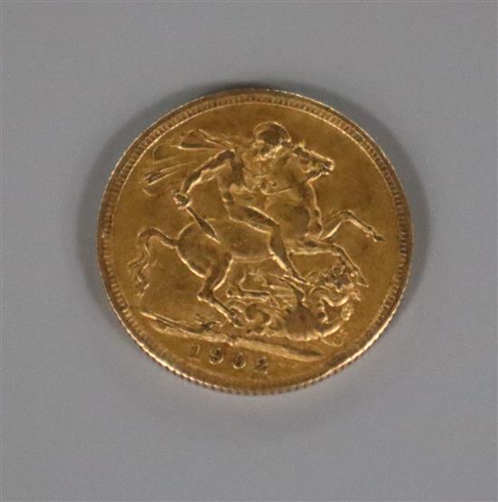 An Edward VII 1902 gold full sovereign.